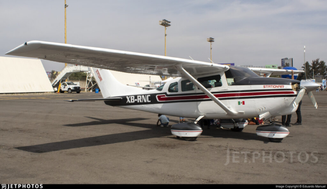 A detailed aviation accident report for a Cessna P206A Super Skylane, registration XB-RNC, which crashed near La Yesca, Nayarit, Mexico, on January 15, 2025. The report includes details about the crash location, the aircraft's journey, and the fatalities, comprising two pilots and four passengers. It also highlights the challenges faced by rescue teams in reaching the site and notes that the cause of the crash remains under investigation.