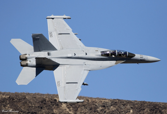 A U.S. Navy EA-18G Growler, assigned to VAQ-135 “Black Ravens,” crashed into San Diego Bay on February 7, 2025, shortly after takeoff from Naval Air Station North Island. The aircraft, identified as Boeing EA-18G Growler 166855, was participating in military exercises when it lost altitude and entered a steep descent. Both crew members ejected safely and were rescued by a fishing boat. Surveillance footage captured the aircraft nosediving into the water near Shelter Island Drive. Emergency teams, including the U.S. Coast Guard and Navy personnel, responded swiftly, securing the crash site near Kellogg Beach. Investigators are reviewing weather conditions, mechanical failure, and pilot disorientation as possible causes. Salvage operations and environmental containment efforts are ongoing as officials continue to assess the incident.